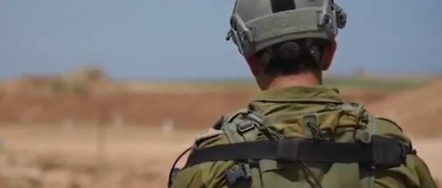Israëlische soldaat bij de grens met Gaza